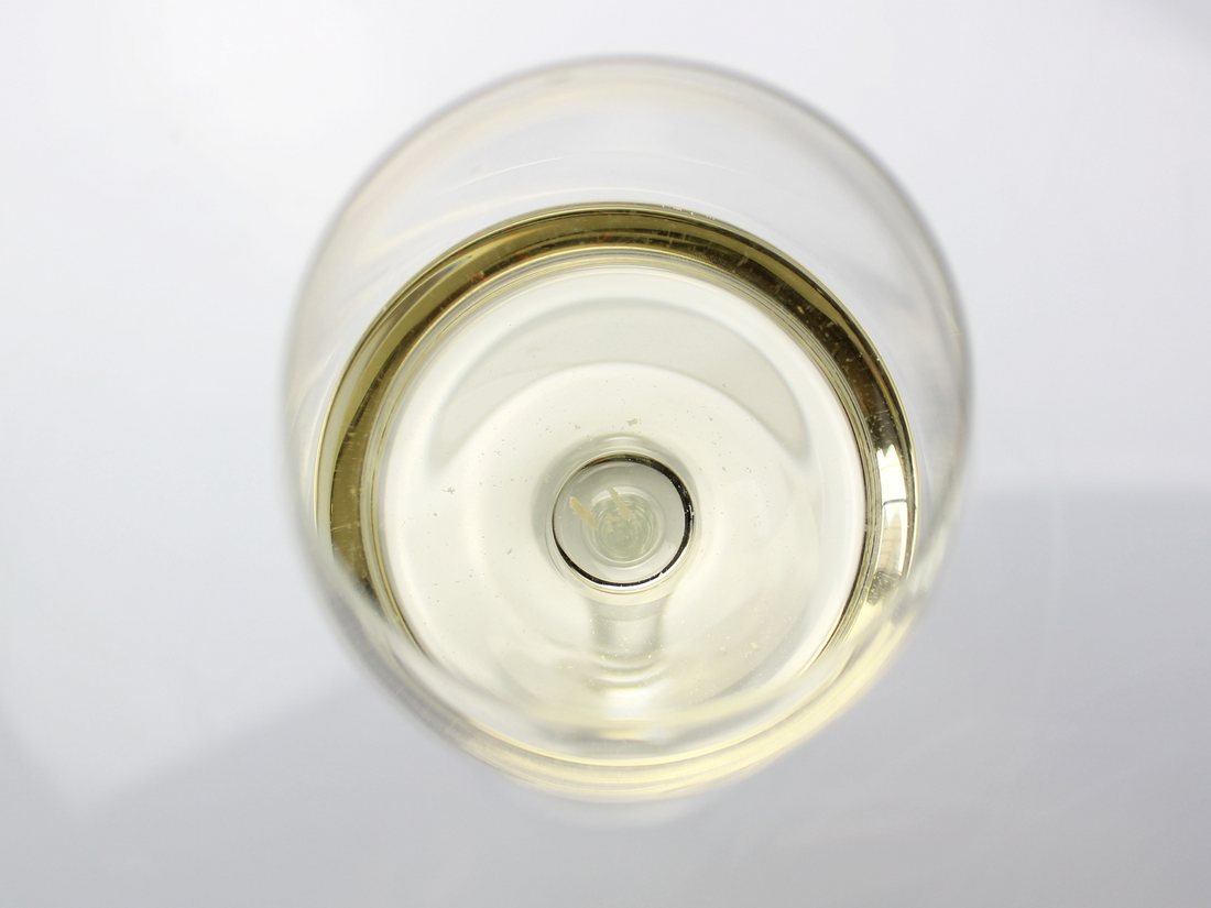 What are those crystal-like pieces floating in the bottom of my wine? What are tartrates?